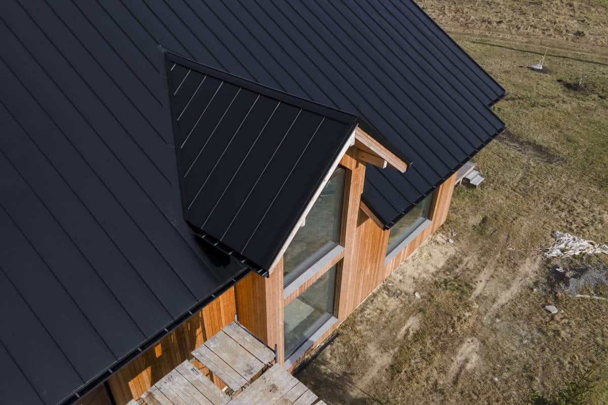 Angled view from above a house of the newly installed roof from Laika Construction.